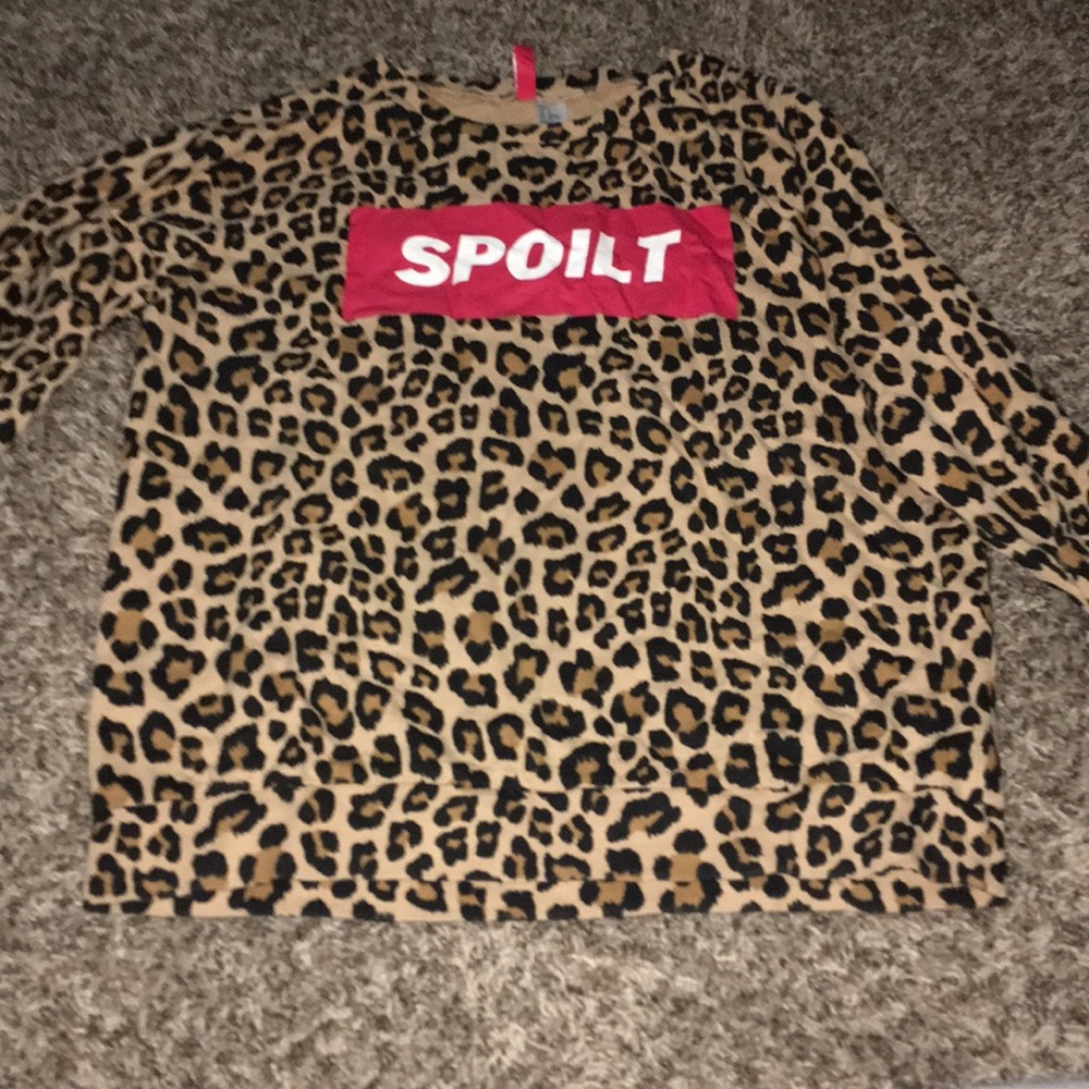 Long sleeve cheetah print sweatshirt. Never worn